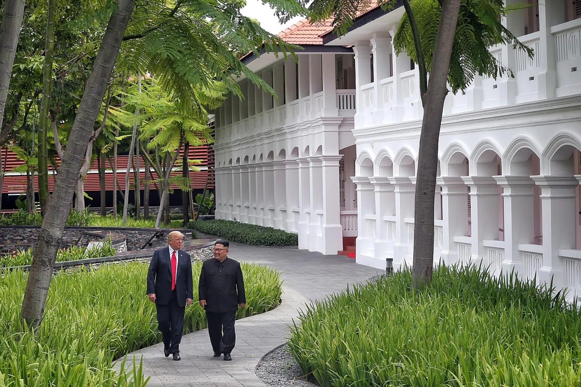 US President Donald Trump and North Korean leader Kim Jong Un strolling in Capella Singapore's garden. 