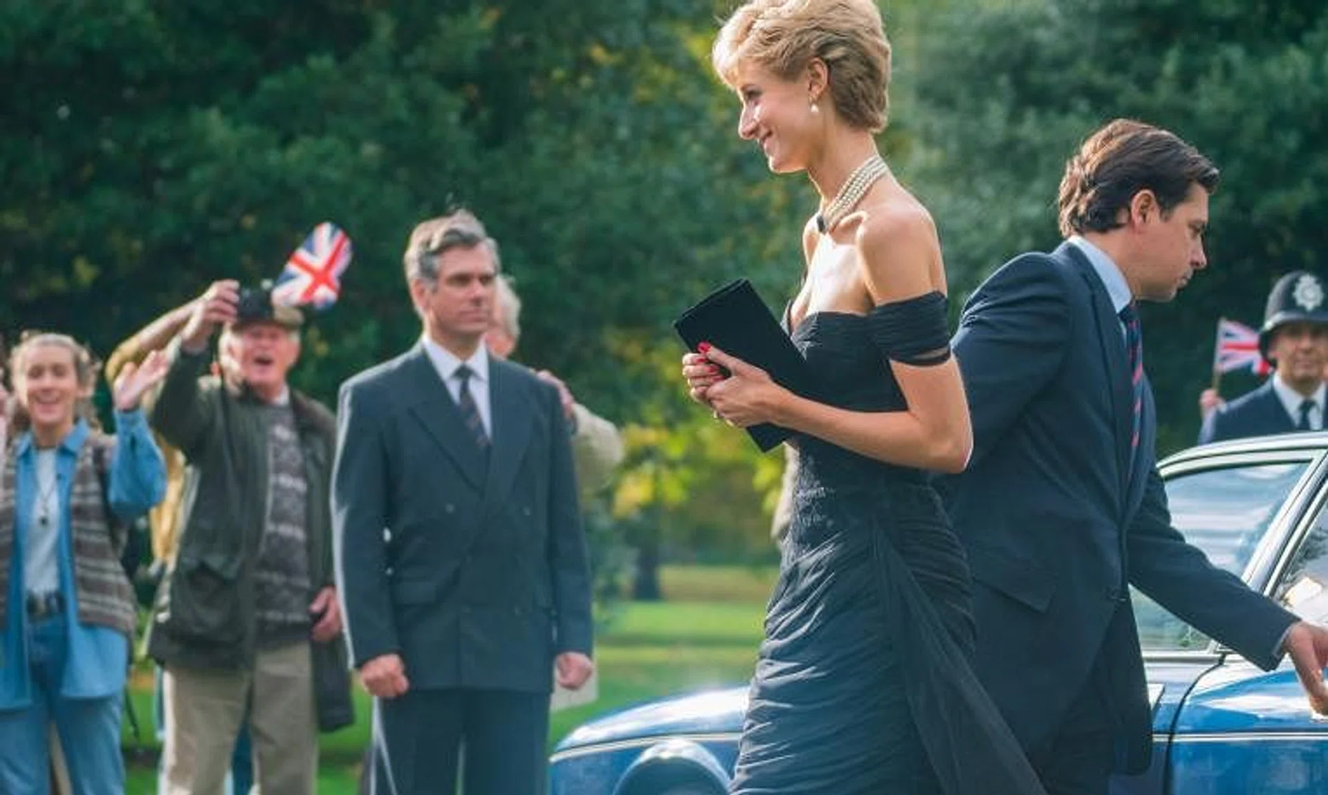 Australian actress Elizabeth Debicki as Princess Diana wearing the "revenge" dress in The Crown.