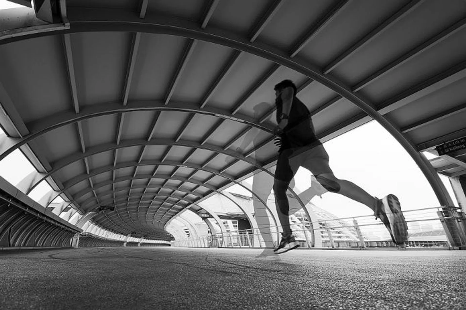 PERSPECTIVE: Mr Lim took this shot for the theme '#NoFilter + #NewPerspective + #SPACE'. He positioned the camera on the ground and captured himself along a bridge near the Stadium MRT station.