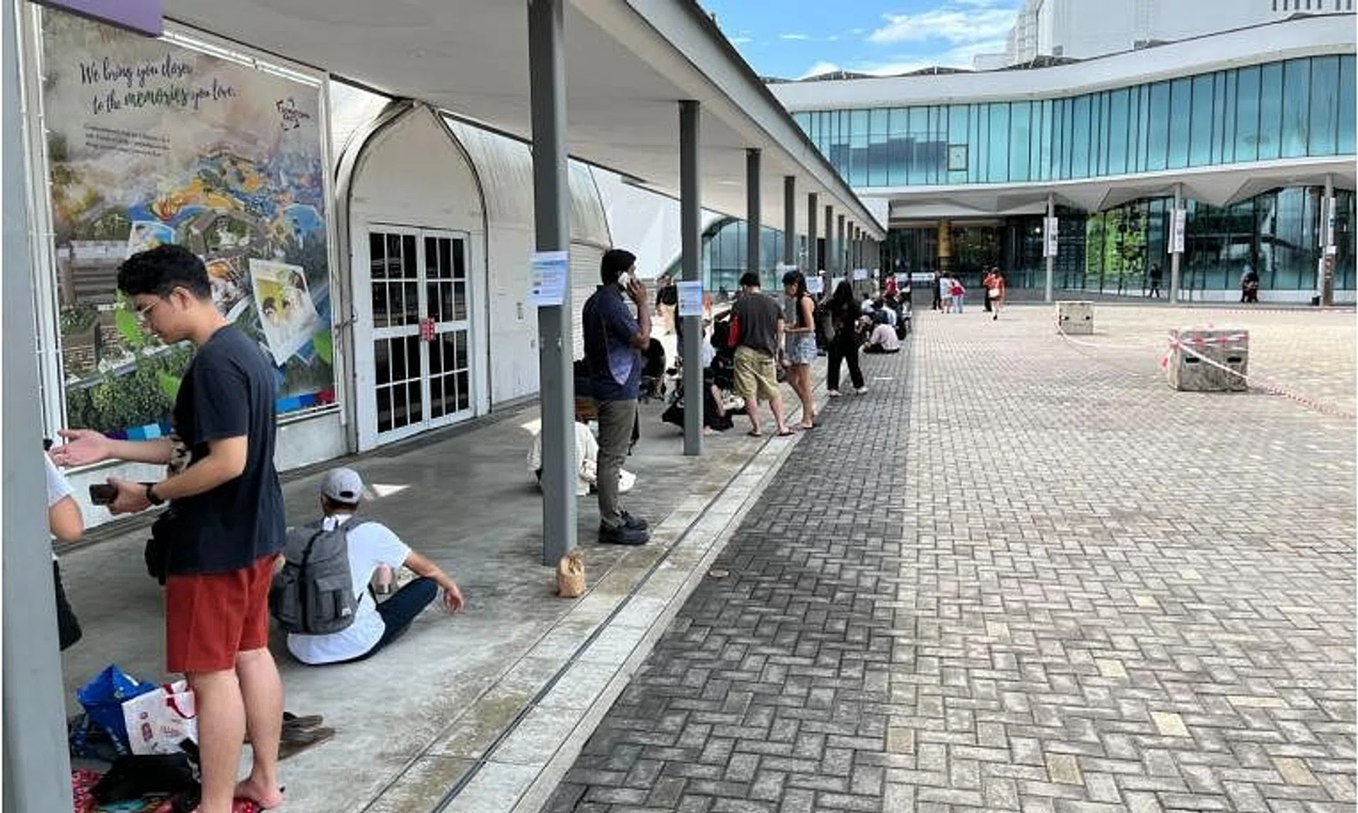 Fans queue at Downtown East for Taylor Swift tickets on July 7, 2023.