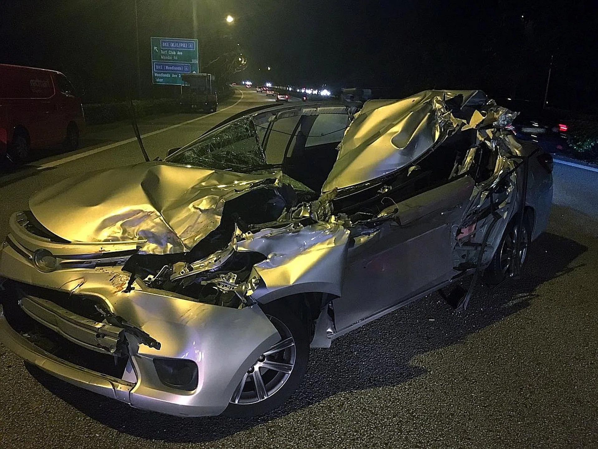 Wreckage of the Uber car, after it crashed into the rear of a stationary lorry along SLE on Sept 25 last year. PHOTO: COURTESY OF ST READER