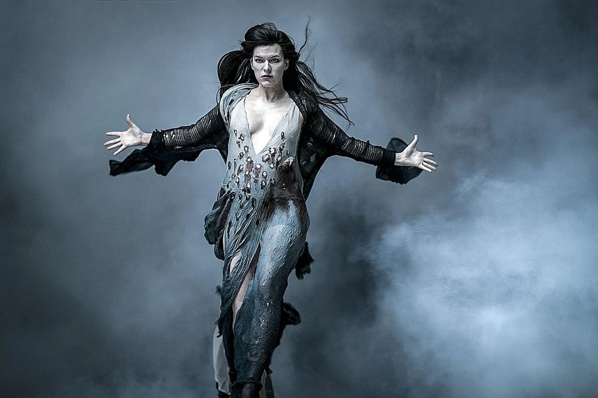 Milla Jovovich morphs into the Blood Queen who seeks to destroy mankind in Hellboy. 