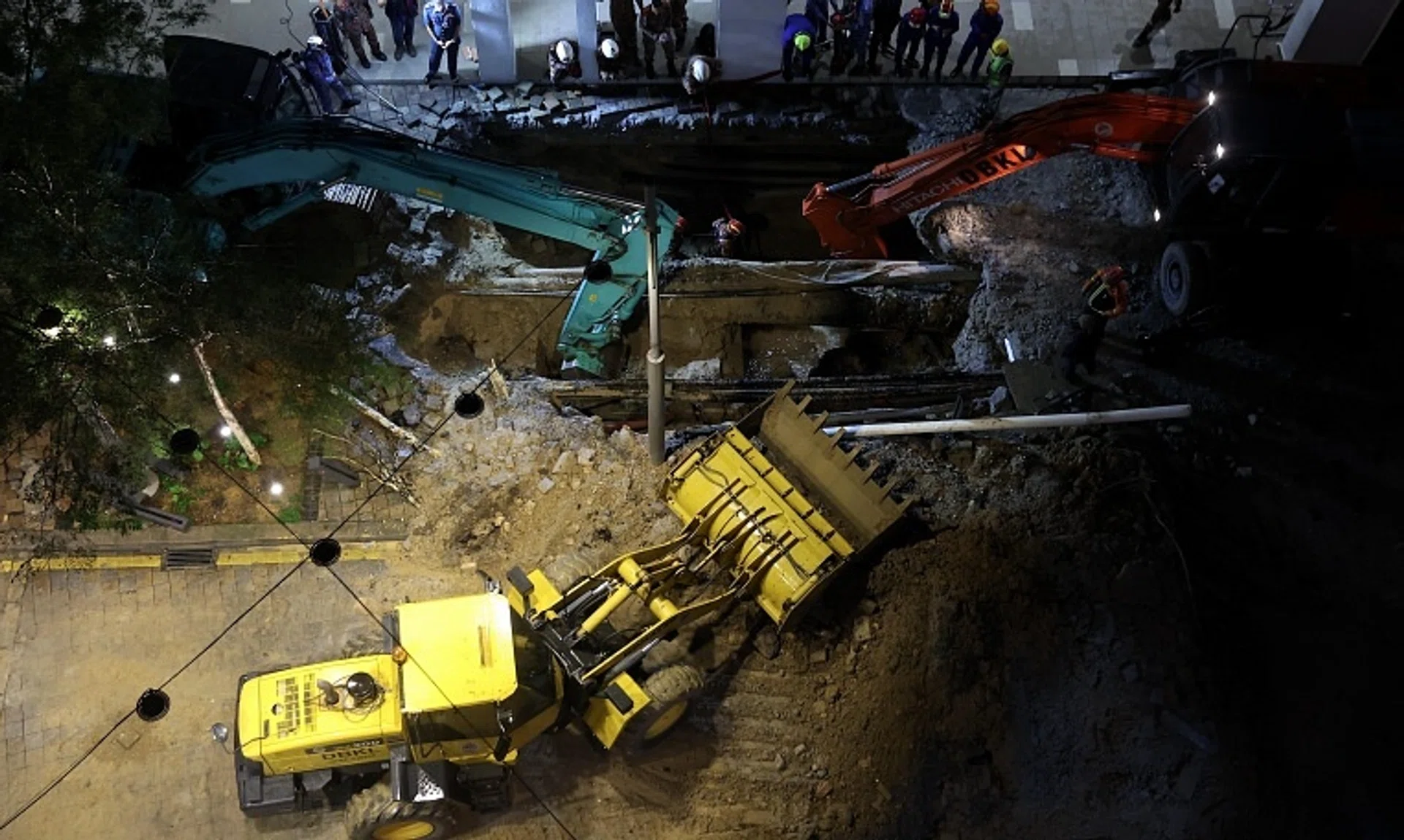 High-powered water jets are being used to break up the debris.