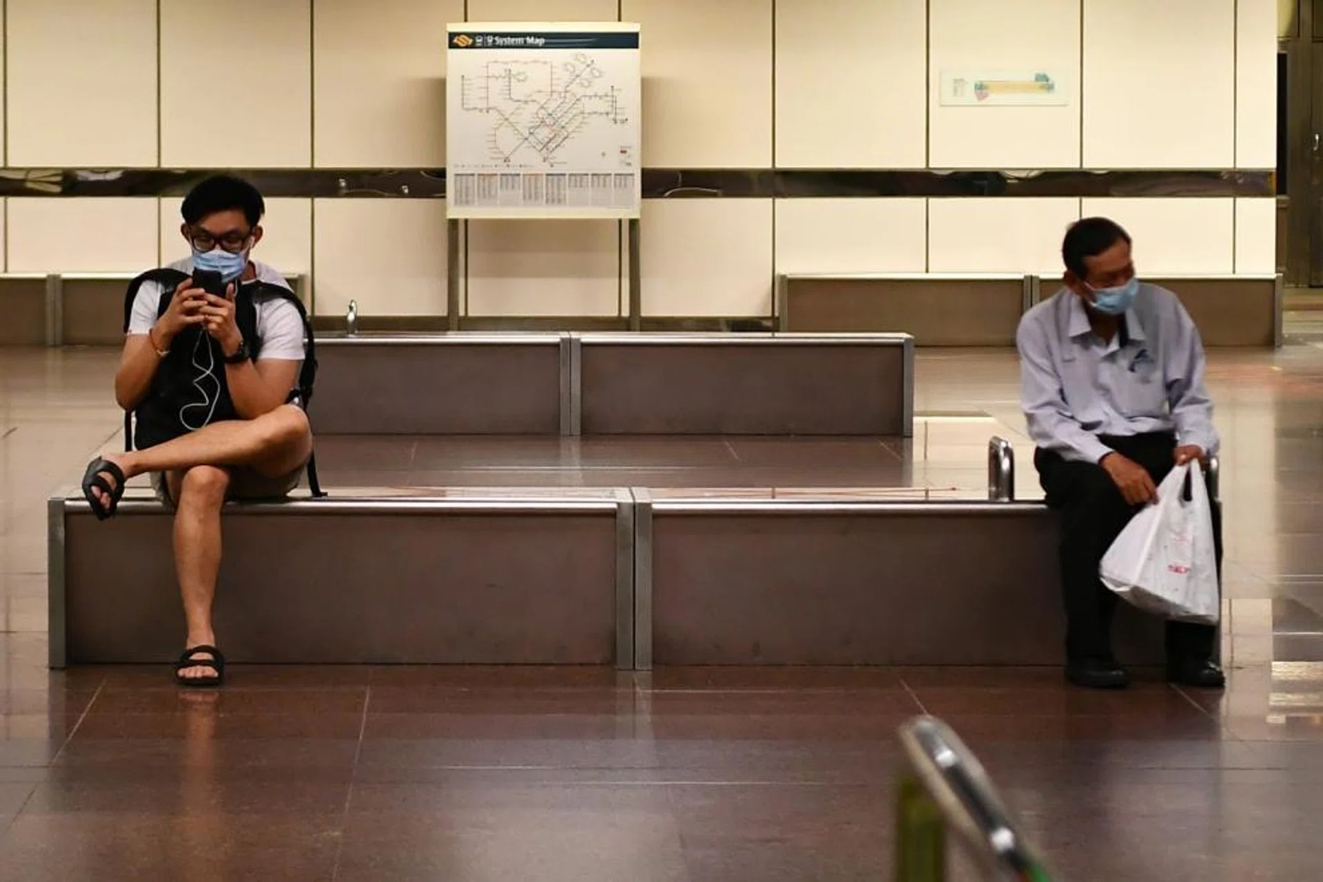 Social distancing at City Hall MRT station.
