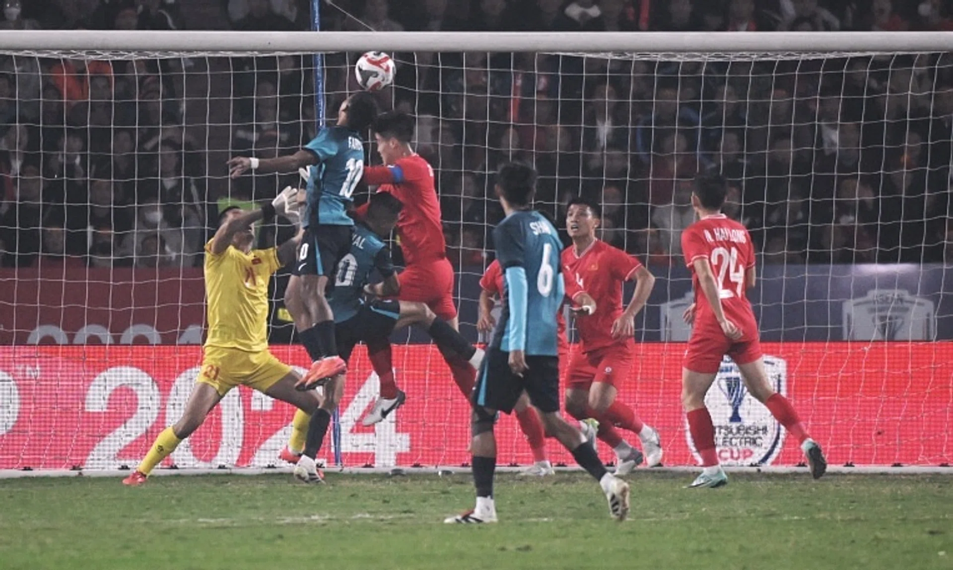 Singapore's Faris Ramli heading in a goal against Vietnam which was later disallowed.