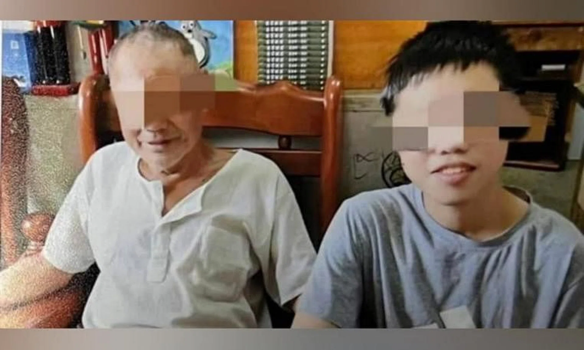 A photo, widely used online, purportedly of Mr Lai (right) and his father. The younger man fell to his death from a flat on the 10th floor in the city of Taichung in Taiwan on May 4.