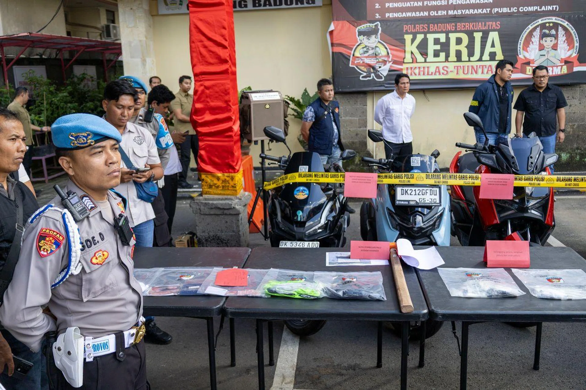 Evidence on display include masks and jackets allegedly worn by the attackers, as well as a sledgehammer said to have been used to smash in the door at the villa.