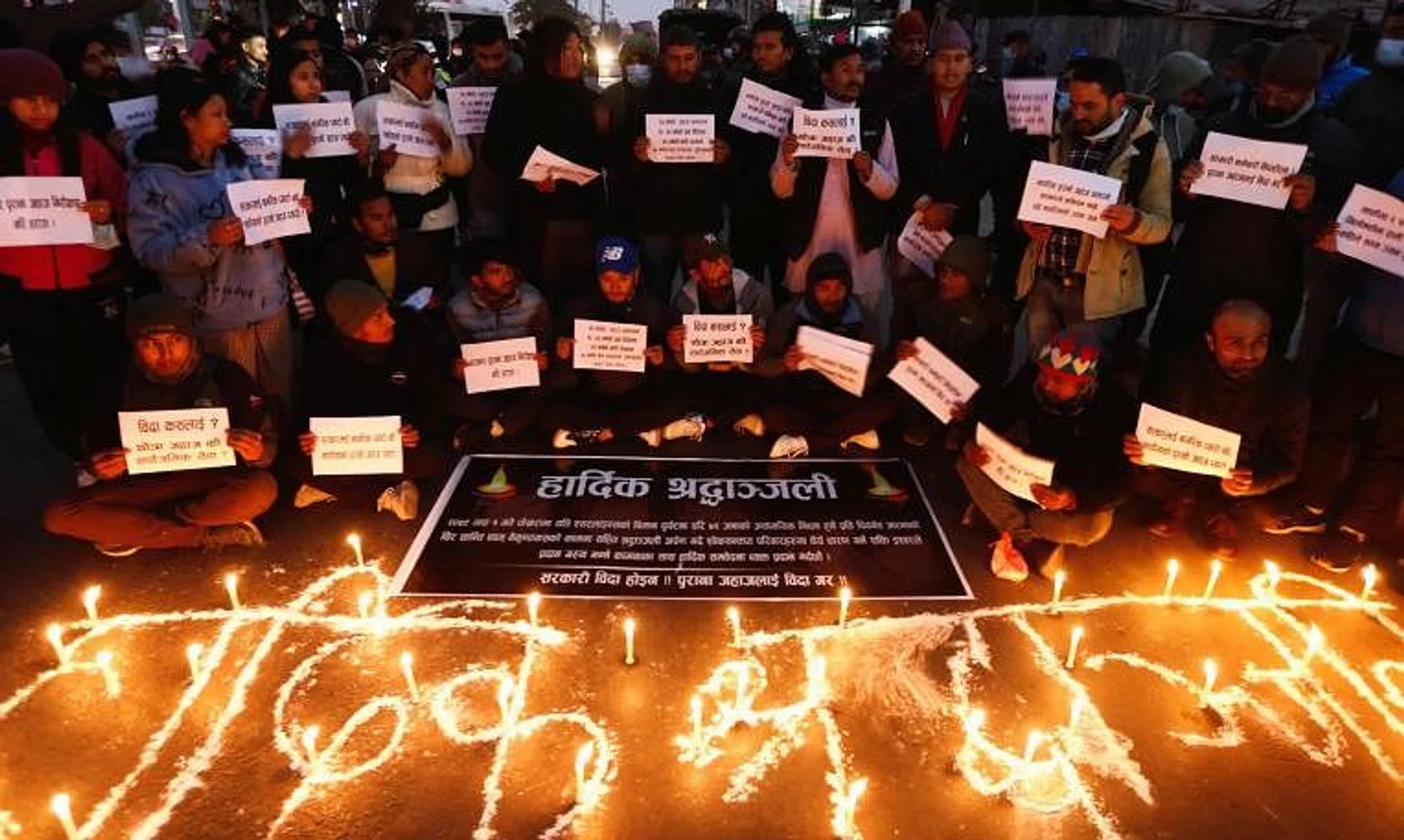 Mourners and protesters gather for a memorial and rally for the victims of Nepal's worst air disaster in nearly 30 years.