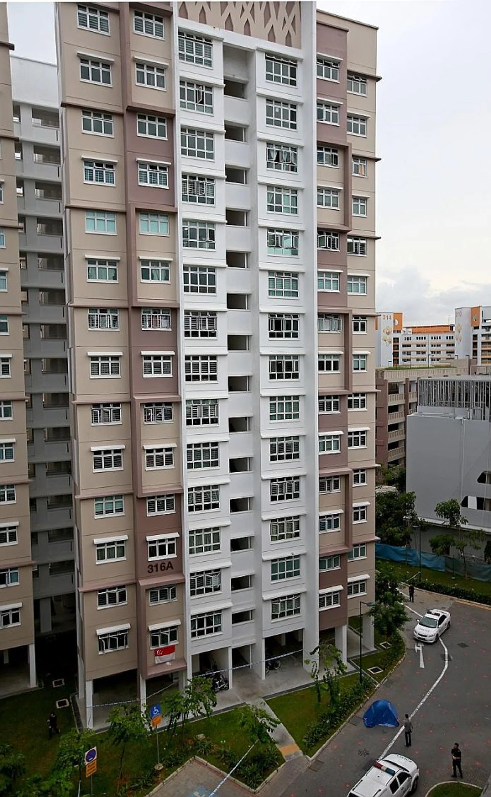 TRAGEDY: Benjamin Lim's body was found at the bottom of this block of flats in Yishun on Jan 26.