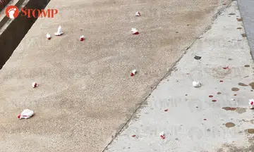 Bloodstained tissues and ART kit thrown down Ang Mo Kio block