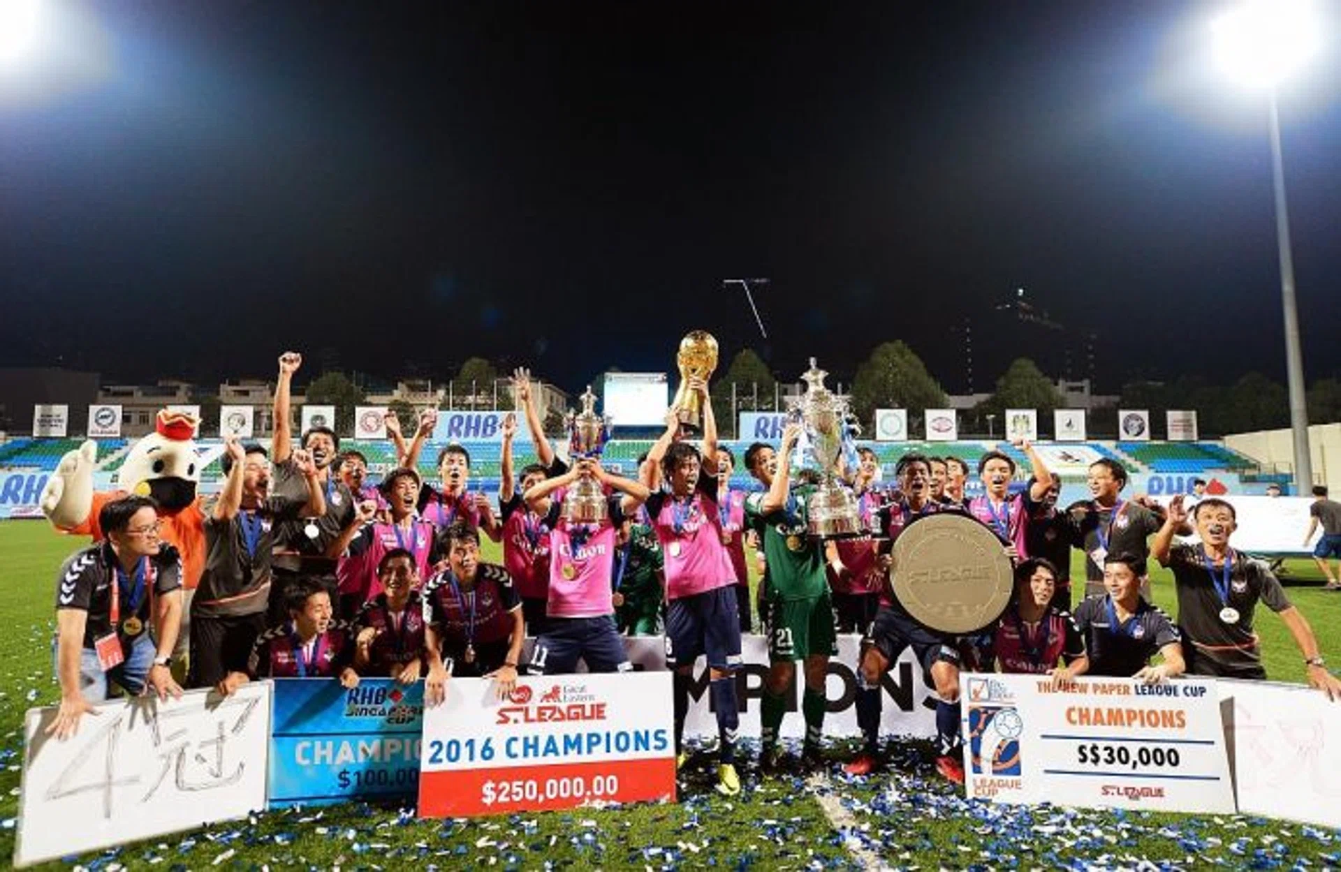 ACHIEVEMENT UNLOCKED: The Albirex squad celebrating an unprecedented quadruple of (from near right) The New Paper League Cup, the S.League, the RHB Singapore Cup and the Community Shield.