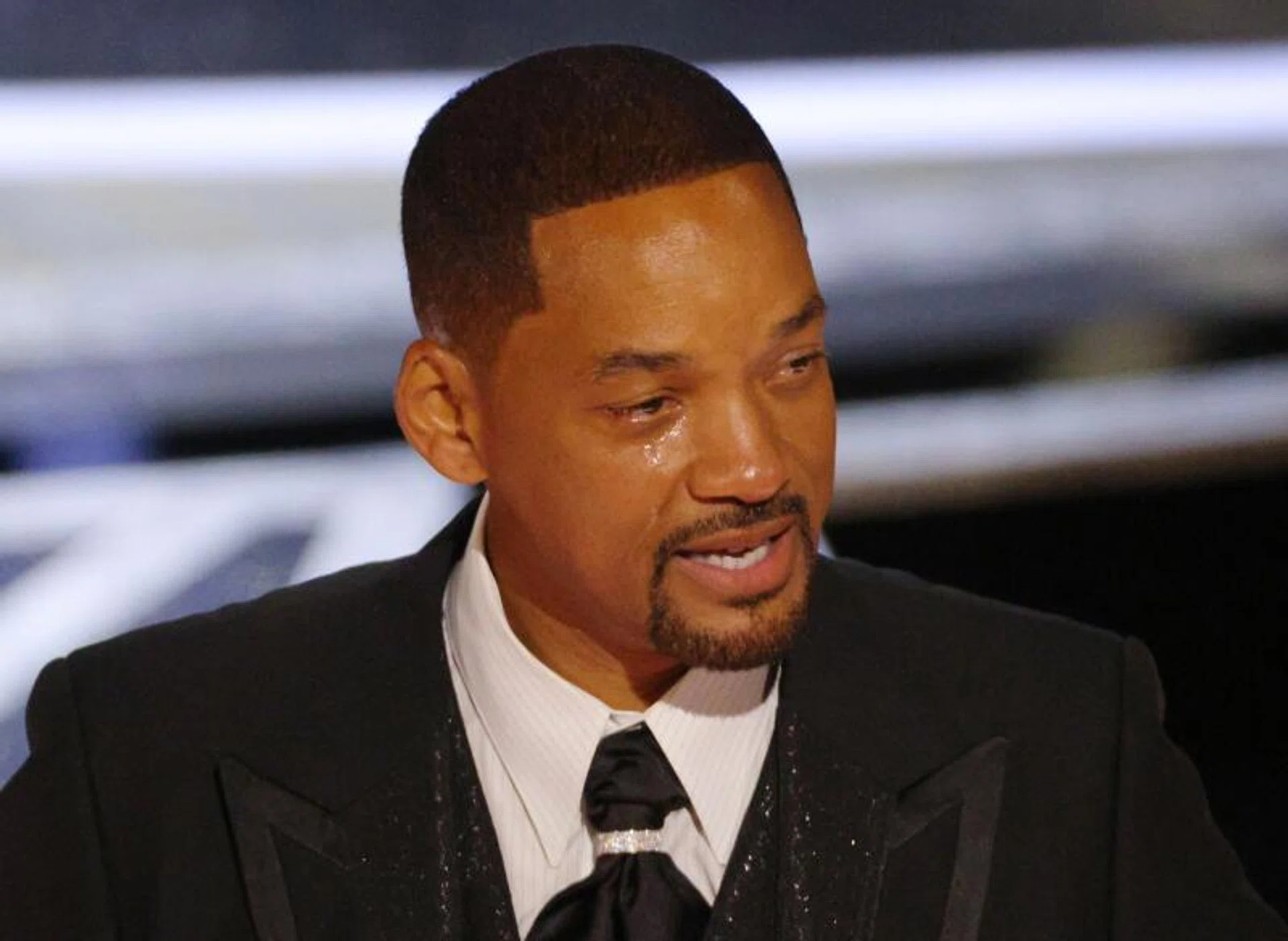 Will Smith accepts the Oscar for Best Actor in King Richard at the 94th Academy Awards, on March 27, 2022.