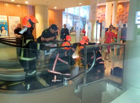 Boy's foot stuck in National Library escalator