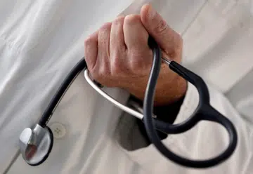 Doctor charged with sexual offences against teens, cheating