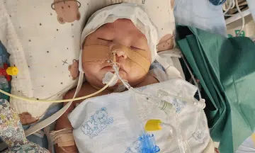 Month-old baby with heart defect had 2 strokes, parents raising money for treatment