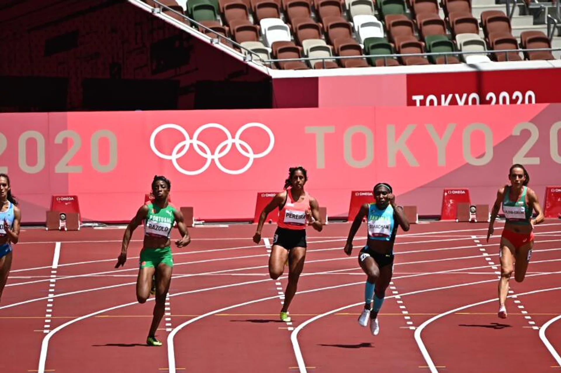 Singapore's Shanti Pereira on her way to setting a season's best in the Tokyo 2020 women's 200m heats.