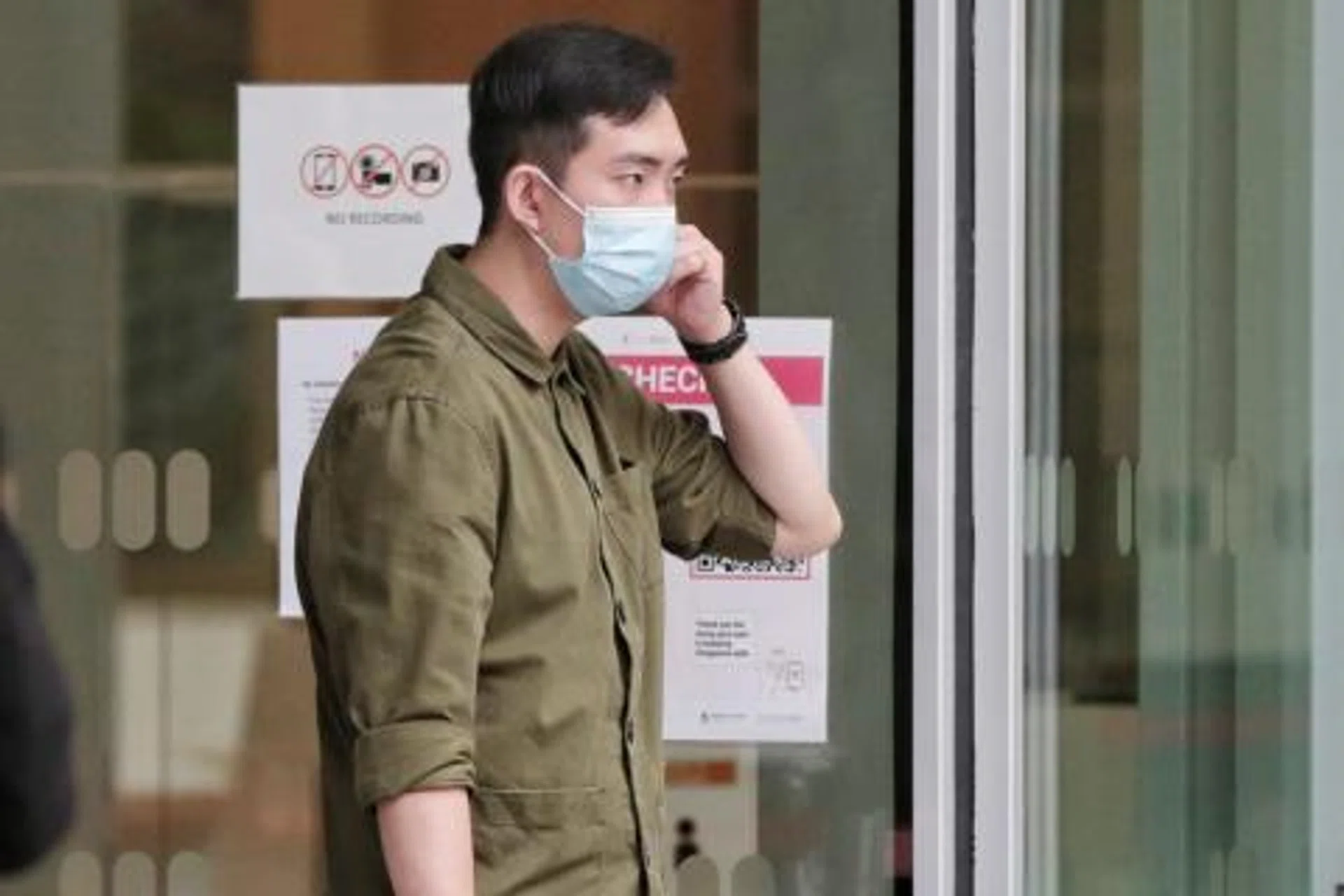 Goh Tian Shun was charged on Thursday with one count each of extortion and cheating by personation.