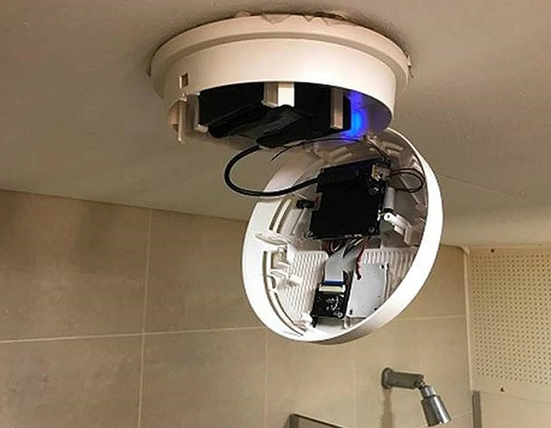 The hidden cameras were disguised as smoke detectors. 