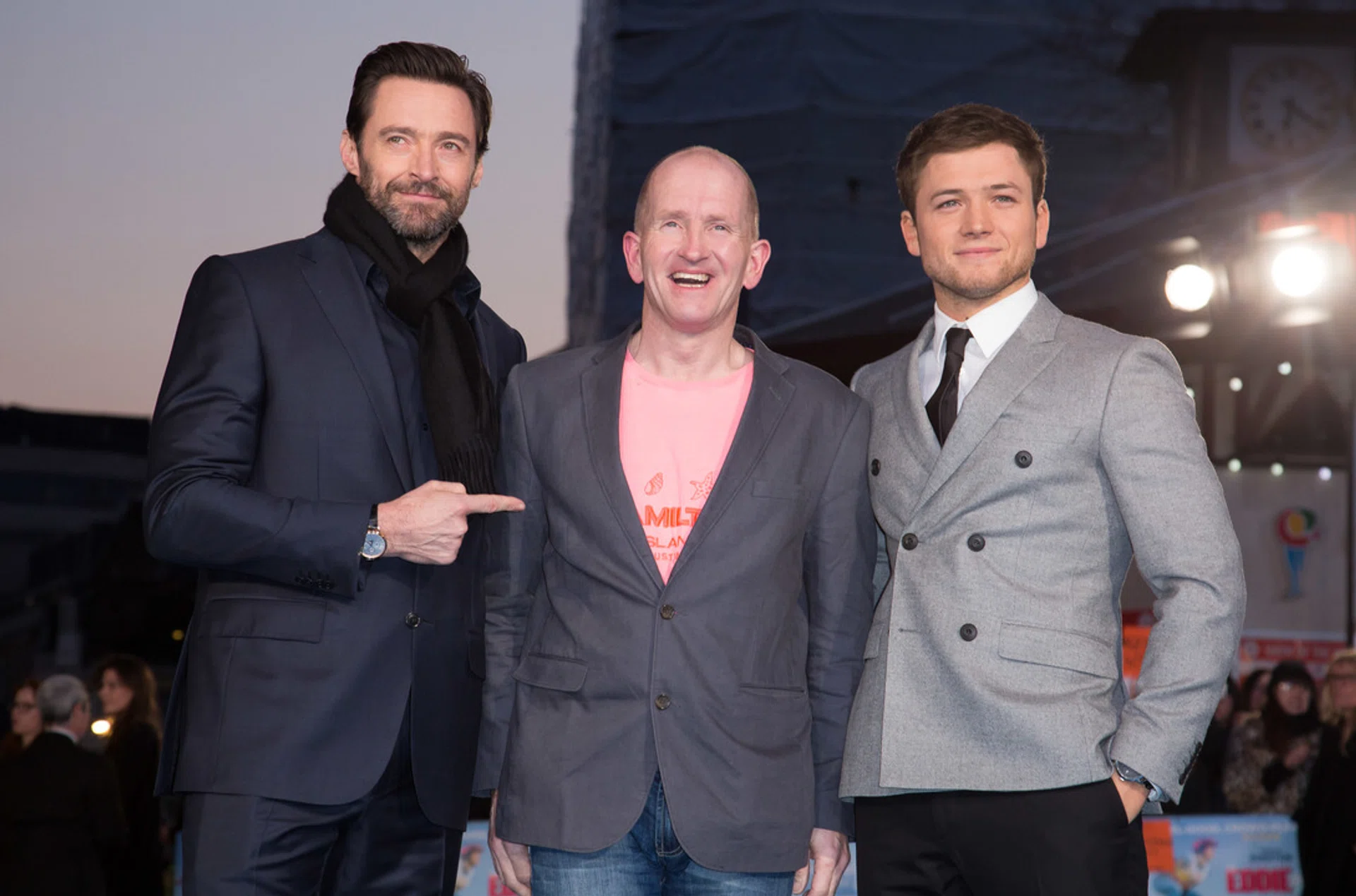 Actors Hugh Jackman (L) and Taron Egerton (R) with Michael “Eddie” Edwards at the European premiere of Eddie The Eagle, which was held on March 17 at the Odeon Leicester Square cinemas in Central London.
 