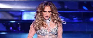 Jlo takes a bow and oops, rips pants