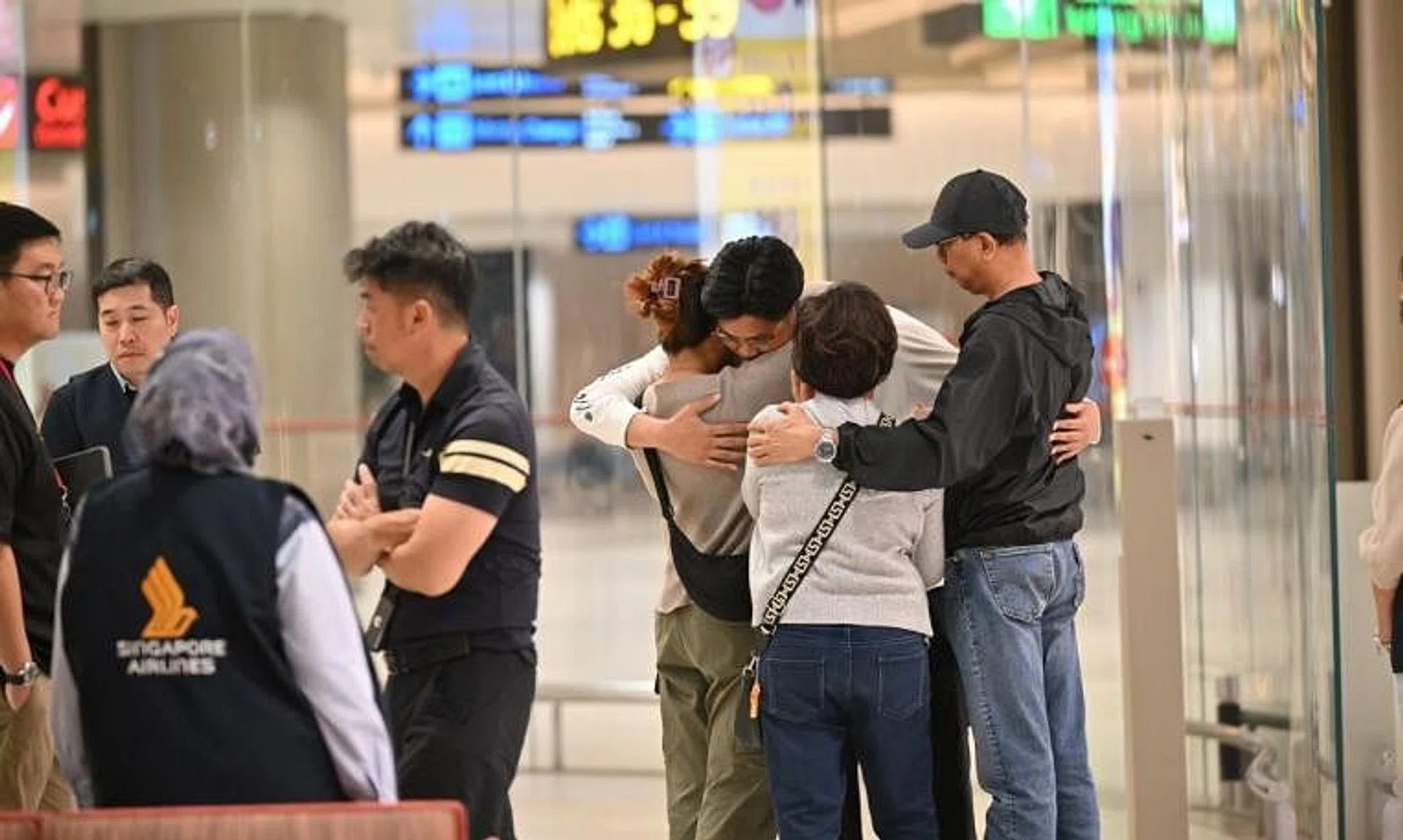 Passengers from SQ321 leaving Changi Airport Terminal 2 at around 5am on May 22, 2024.
