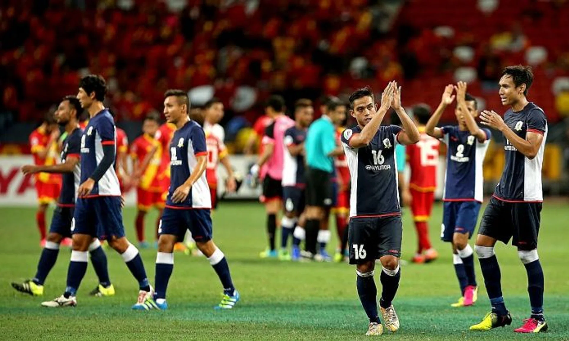 WELL DONE: The Tampines players saluting the crowd after becoming the first S.League team to play at the National Stadium.  