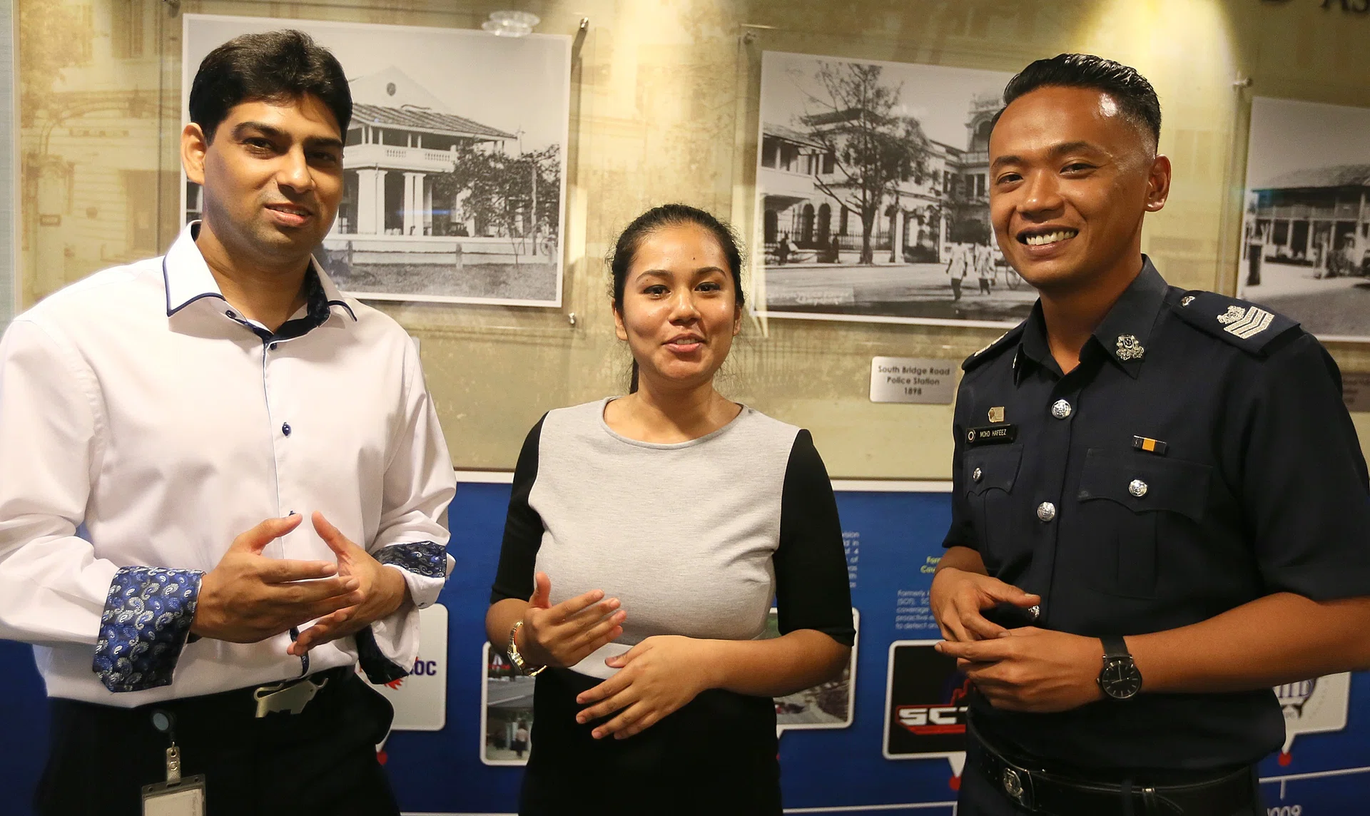 MENTORS: (From left) Outram Secondary School teachers Ajamal Khan and Zaiton Mohamed Punither Basa with Staff Sergeant Mohd Hafeez Mohd. 