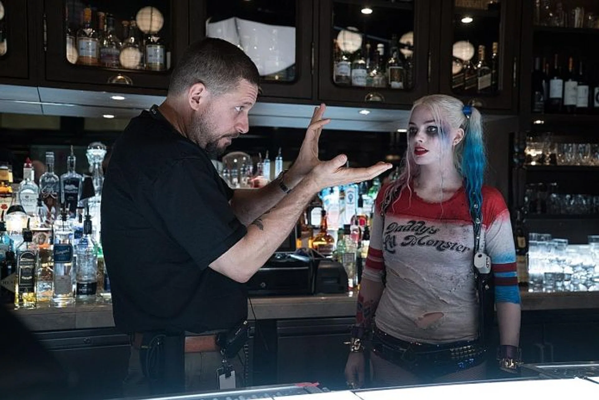 SQUAD LEADER: David Ayer directing Margot Robbie (above)  in Suicide Squad.