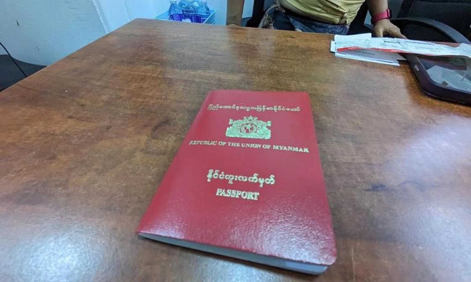 Myanmar national May Kyaw found out that her passport was invalid when she was going to fly from Singapore to Thailand. 
