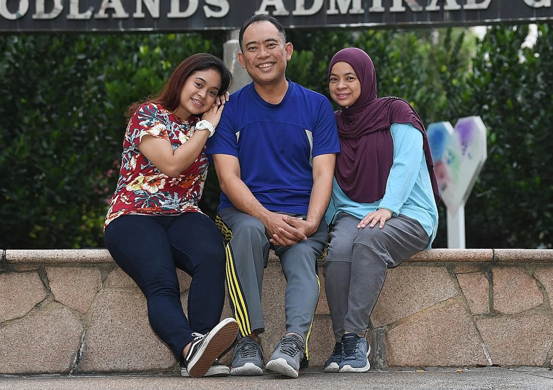 (From left) Ms Nurul Ashikin with her father Abdul Wahab Hassan and mother Siti Zuraidah Khamis.