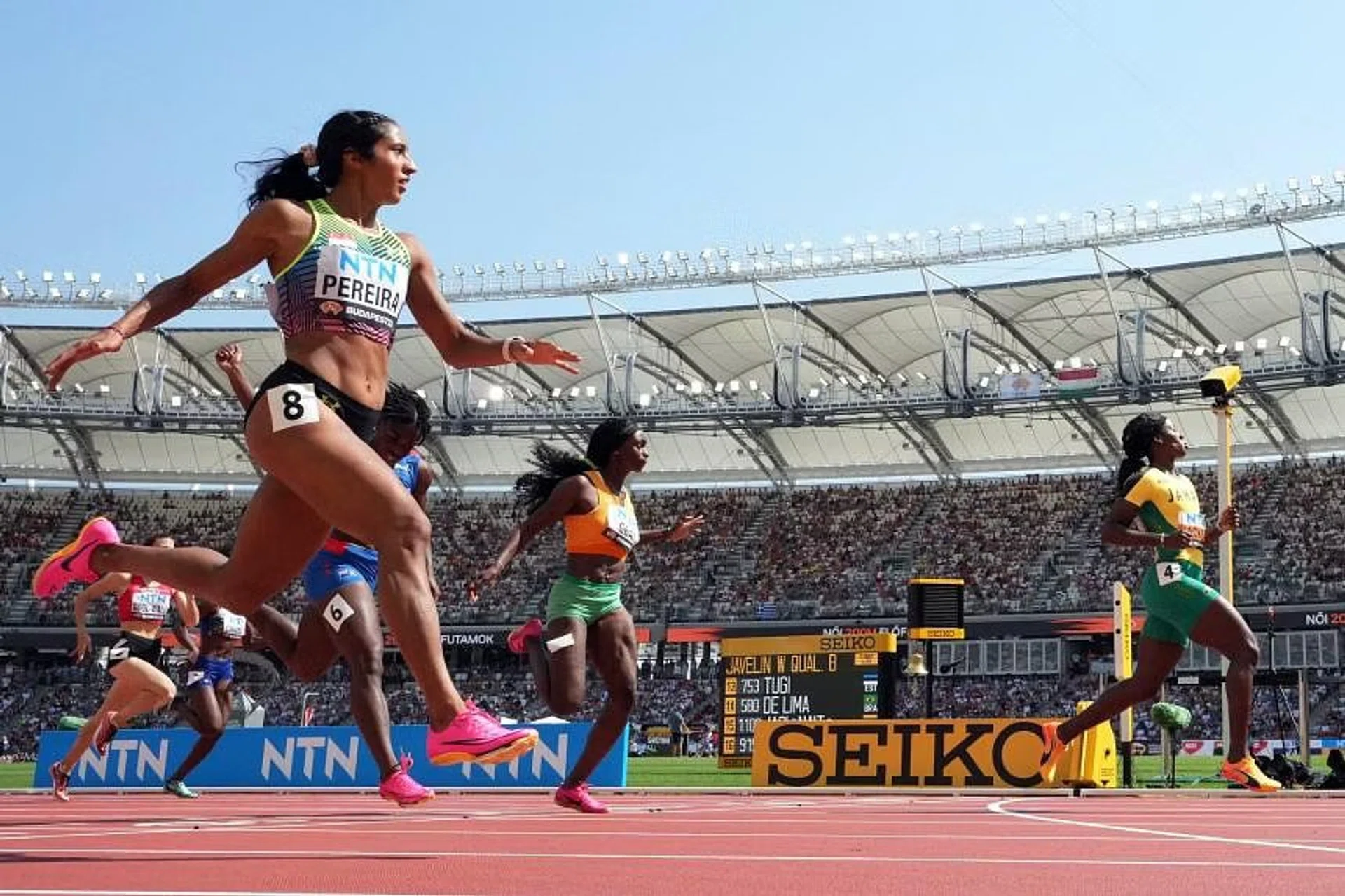 Singapore's Shanti Pereira (left) clocked 22.57 seconds to finish second in Heat Three behind Jamaica’s defending champion Shericka Jackson (22.51sec). 