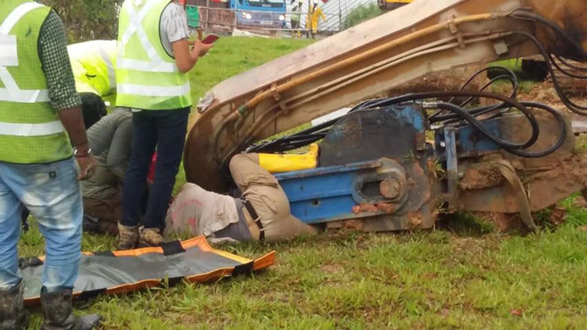 A worker’s left leg was trapped after an excavator fell at a Tampines worksite.