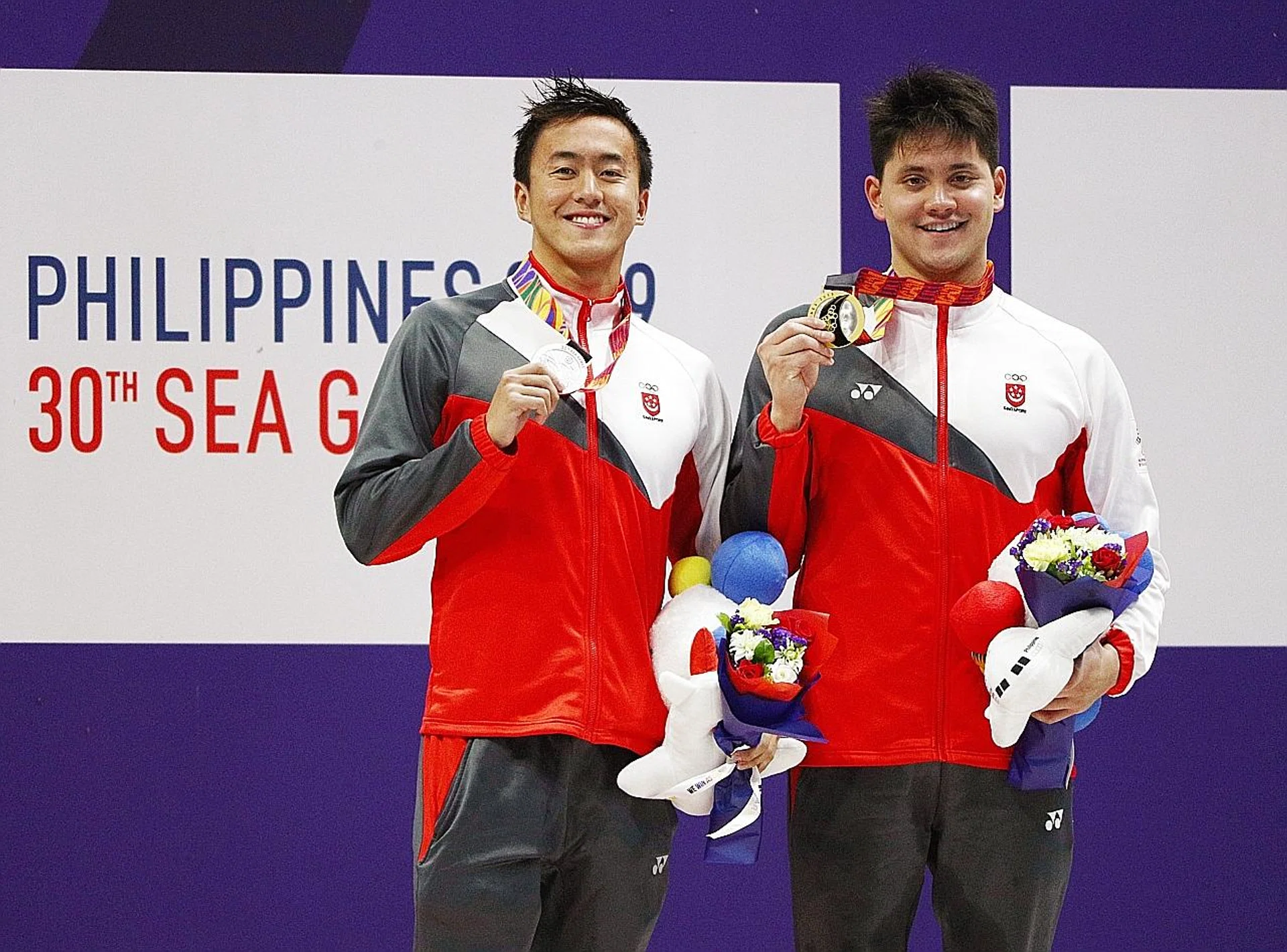 Joseph Schooling (right) and Quah Zheng Wen. 