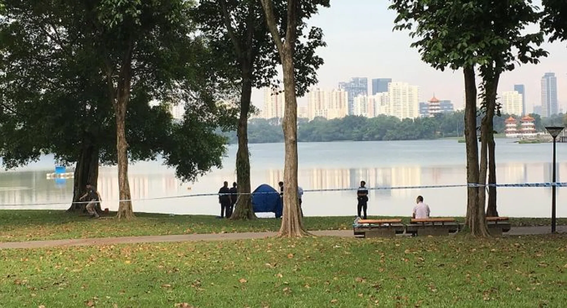 DEATH: Police cordon off the area where the body was found.