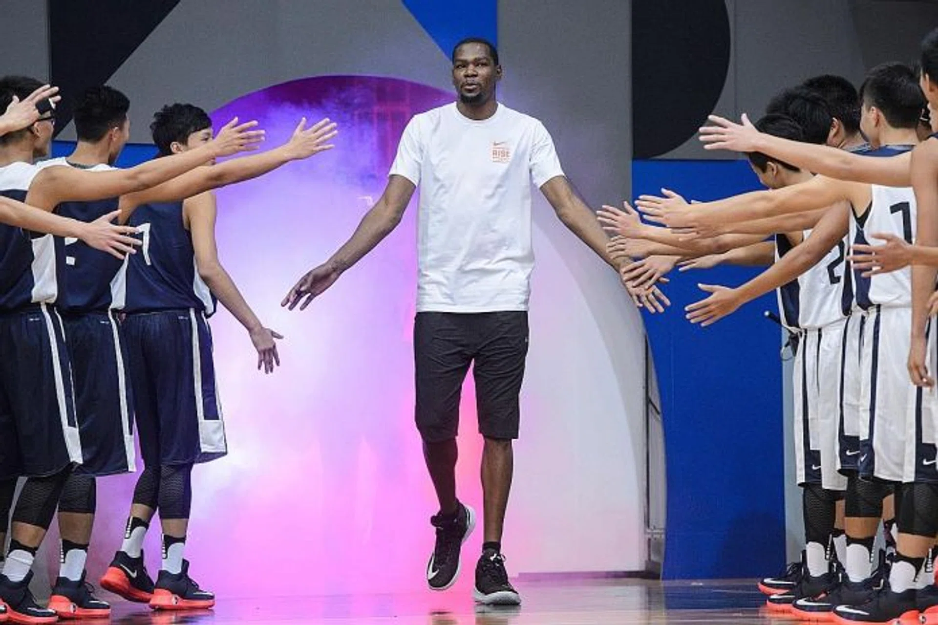 STAR MAN: Durant (centre) at a promotional event in Hongkong on Tuesday.