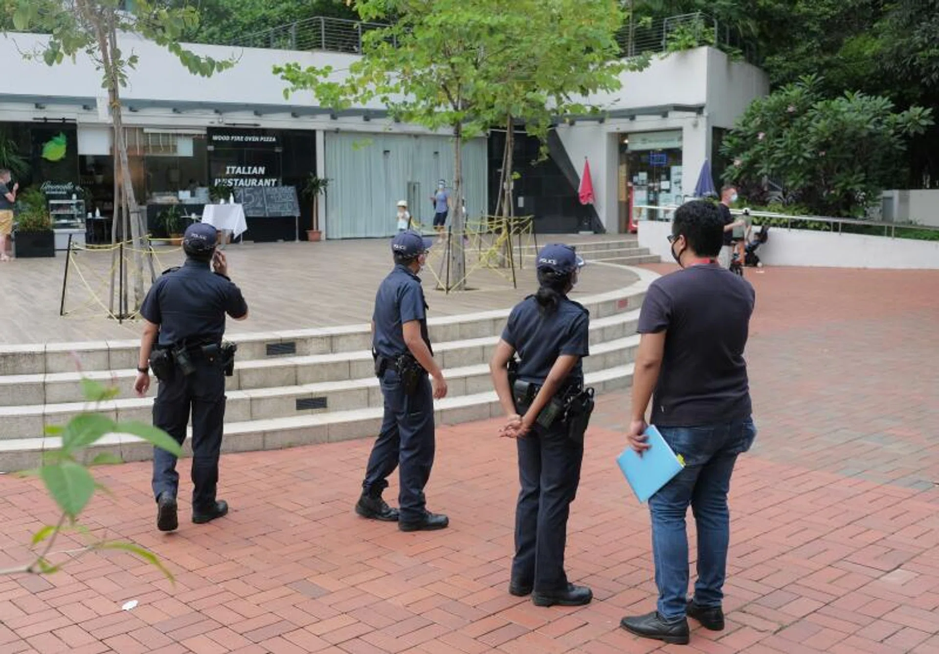 The police patrolling the park connector along Robertson Quay on May 17, the day when the Urban Redevelopment Authority banned the sale of take-away alcohol at 10 establishments in the area.