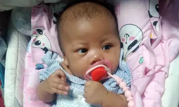 Sleeping position of 2-month-old girl could have played part in her death