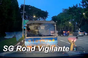 Worker who alights lorry to clear road hazard earns praise from netizens