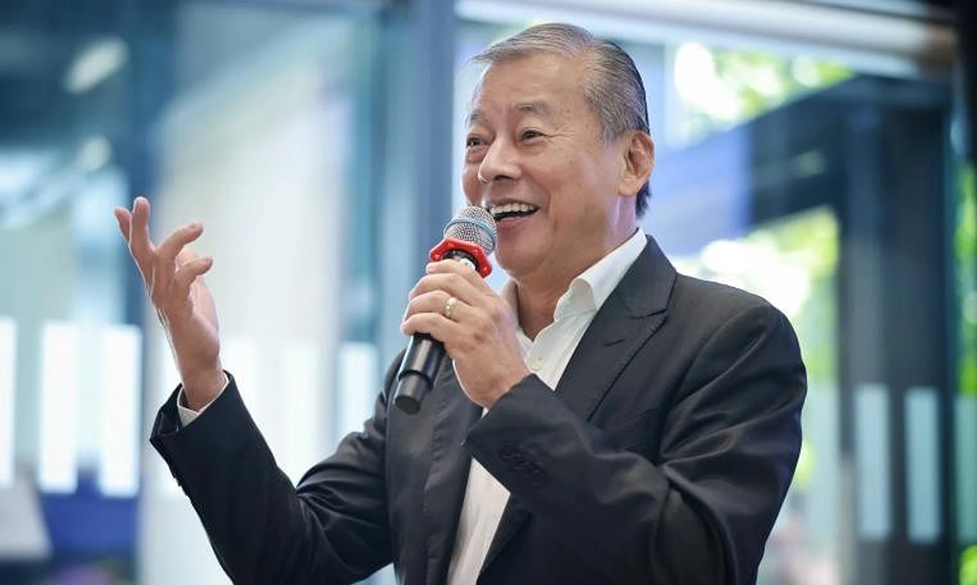 Mr George Goh speaking to young entrepreneurs at an event at SMU Connexion on July 10, 2023.