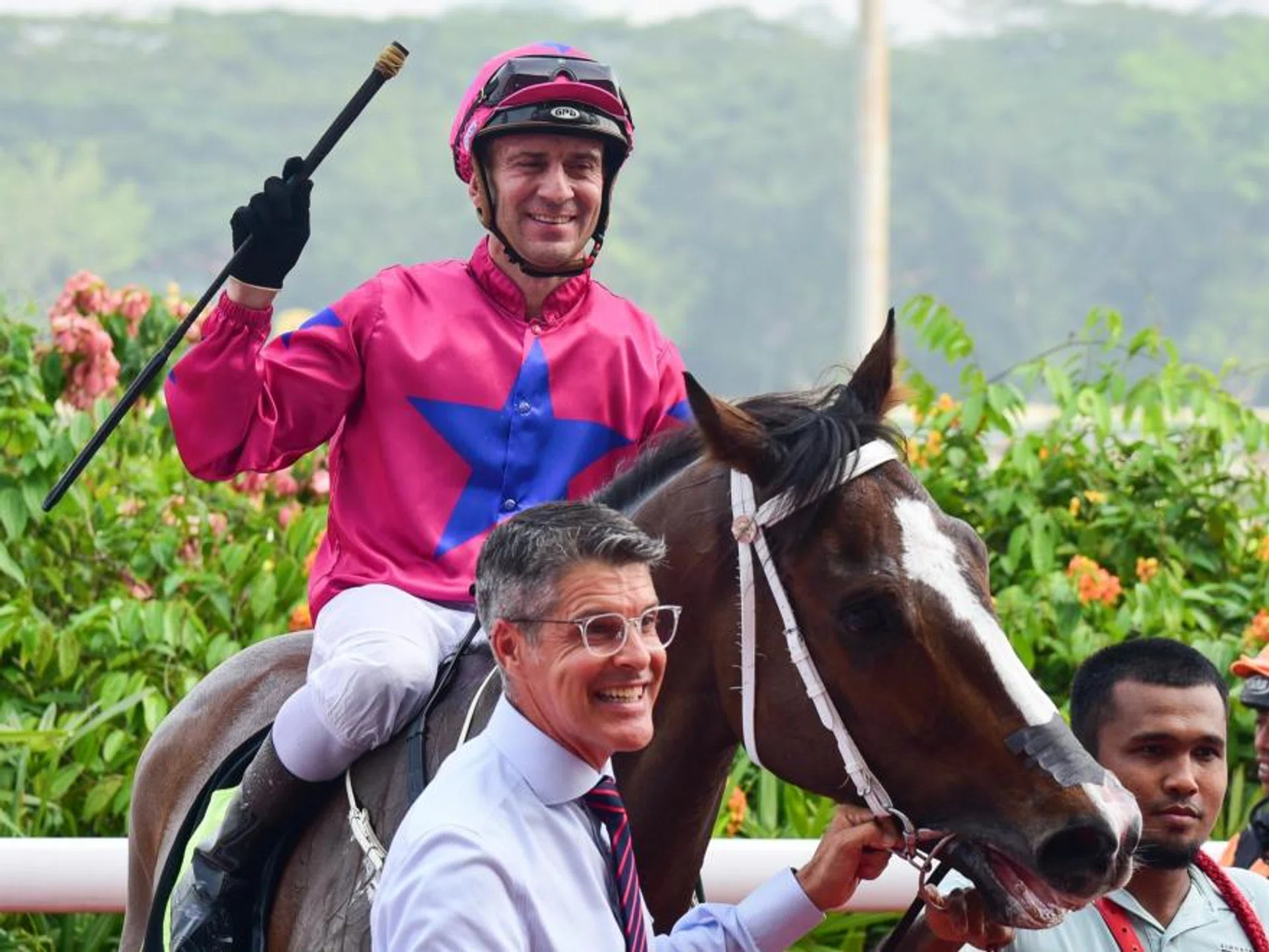 Top jockey Vlad Duric saluting the crowd after winning on the Ricardo Le Grange-trained Bestseller in a Class 3 (1,400m) on Oct 7, 2023.


