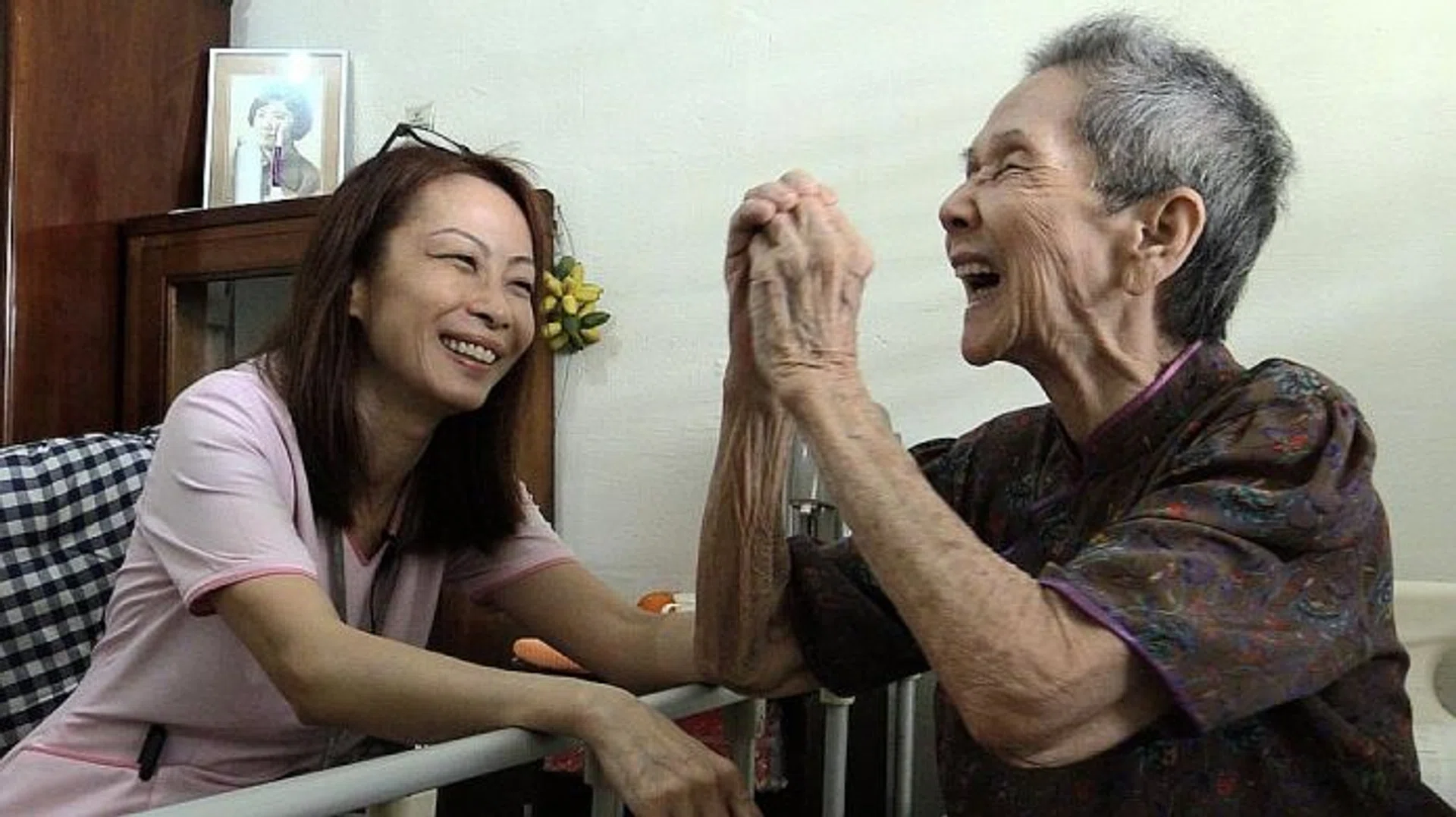 PALLIATIVE CARE: Nurse Amy Lim with one of her patients.