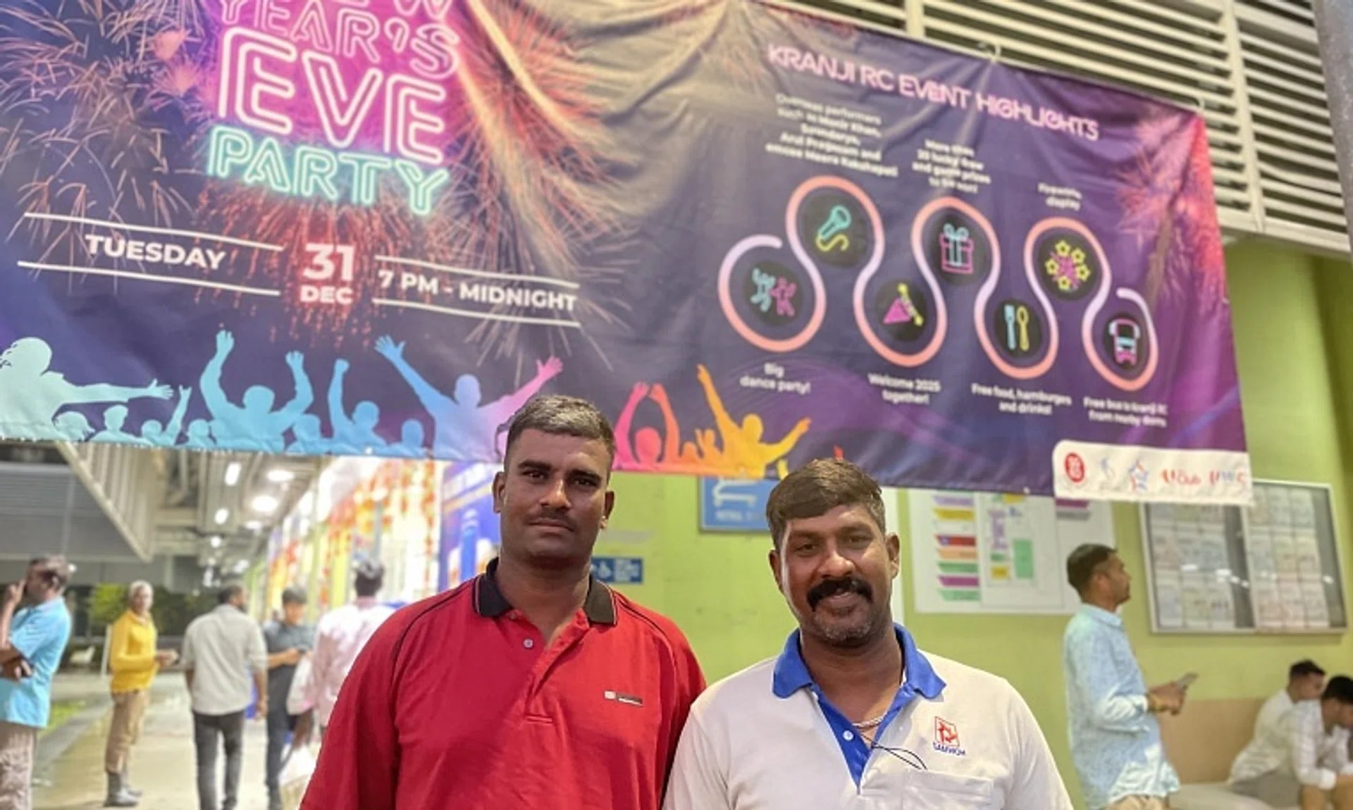 Indian nationals and colleagues Mr Rajamama Santhoshkumar (left) and Mr Vaiyapuri Krishnan attending the New Year’s Eve celebrations at Kranji Recreation Centre on Dec 31.