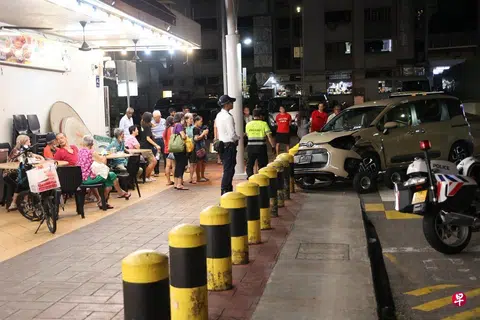 83-year-old driver knocks down delivery rider, almost crashes into coffee shop