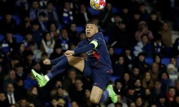 Mbappe brace fires PSG into Champions League quarter-finals