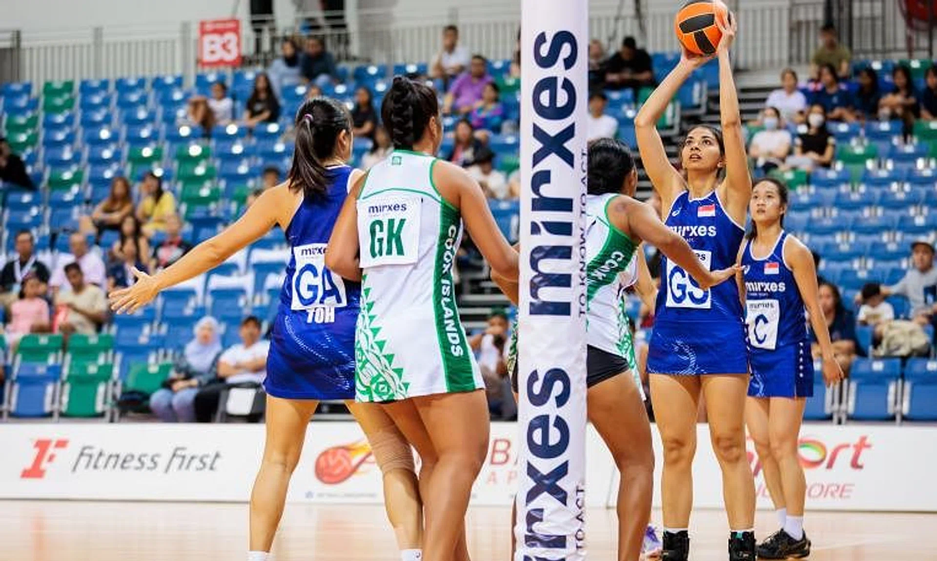 Singapore's Amandeep Kaur Chahal (with ball) attempts a shot during the Republic's 58-36 victory over Cook Islands at the Mirxes Nations Cup.