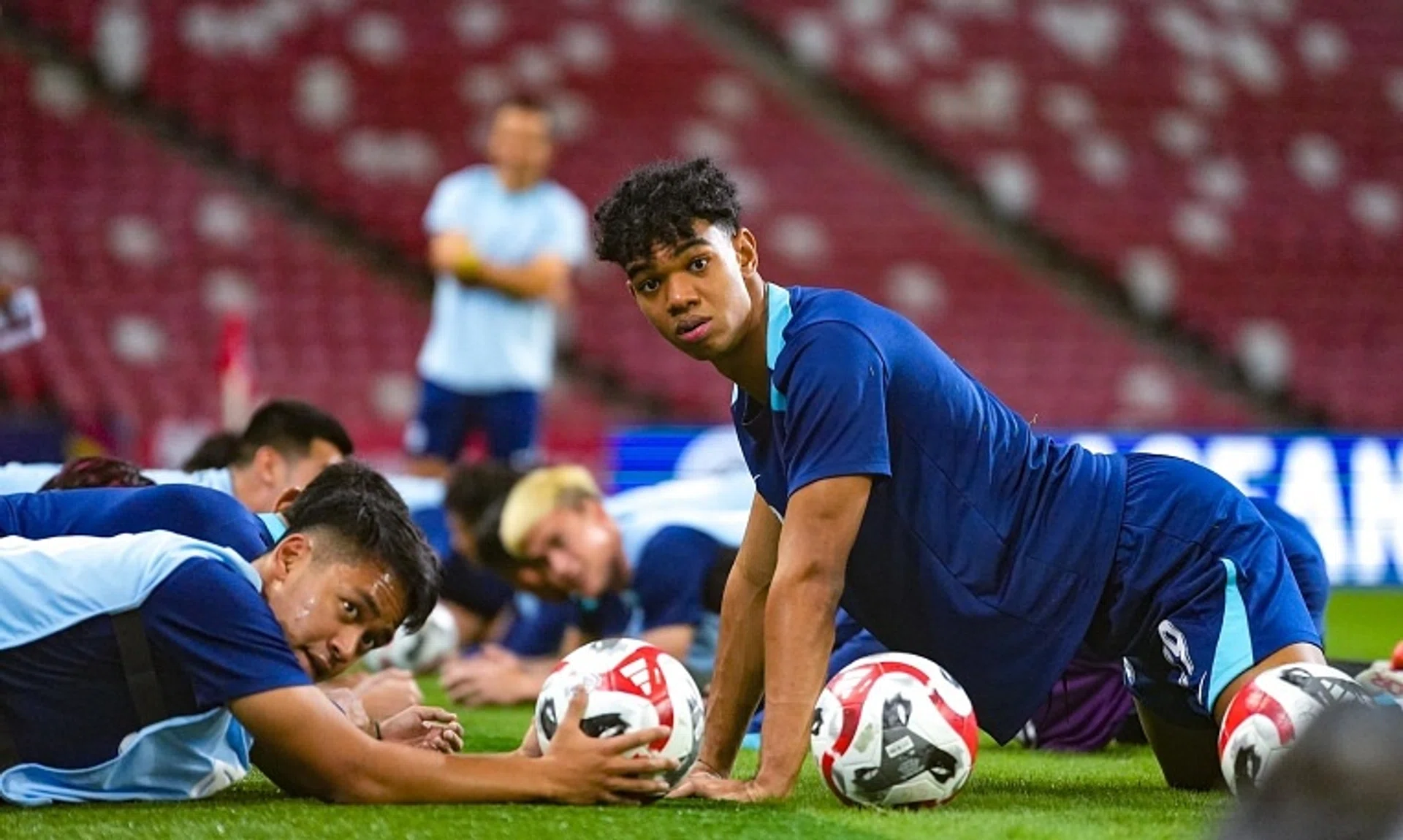 Amirul Adli (left) and Jordan Emaviwe in training at the National Stadium ahead of Singapore's clash with Thailand on Dec 17.
