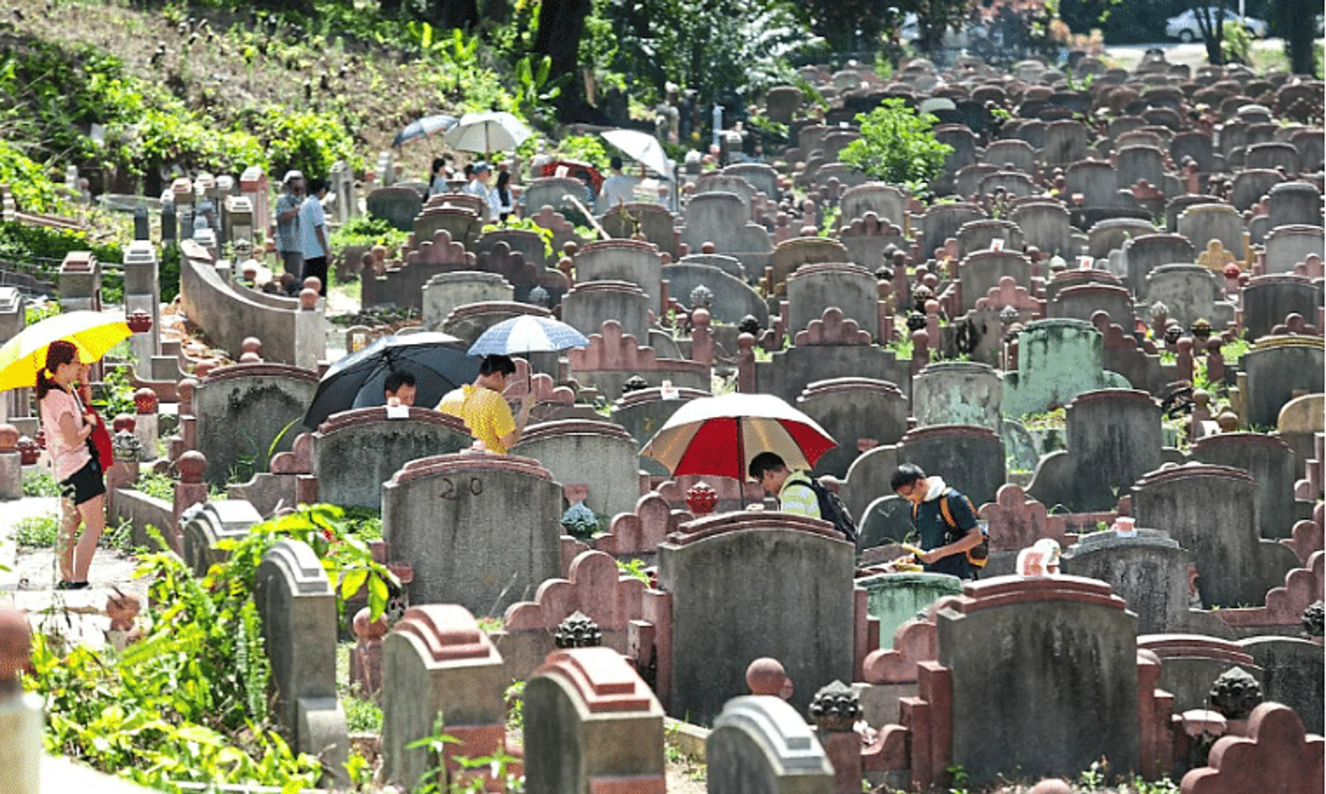 Member of the public seen praying for their departed loved ones at Kwong Tong Cemetery, Kuala Lumpur during the Qing Ming festival.