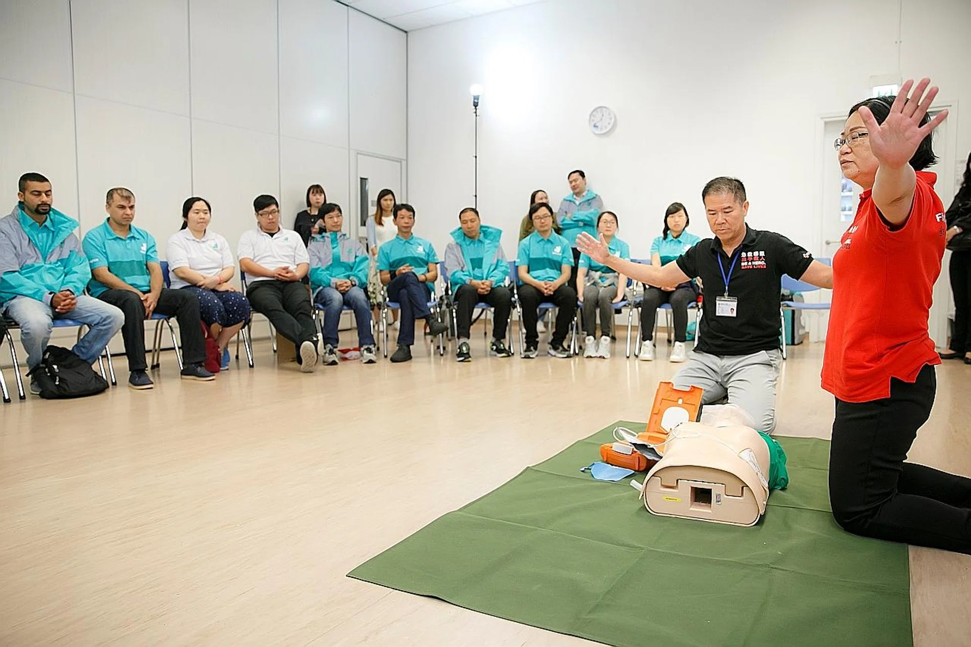 Deliveroo riders at a first-aid training course. 