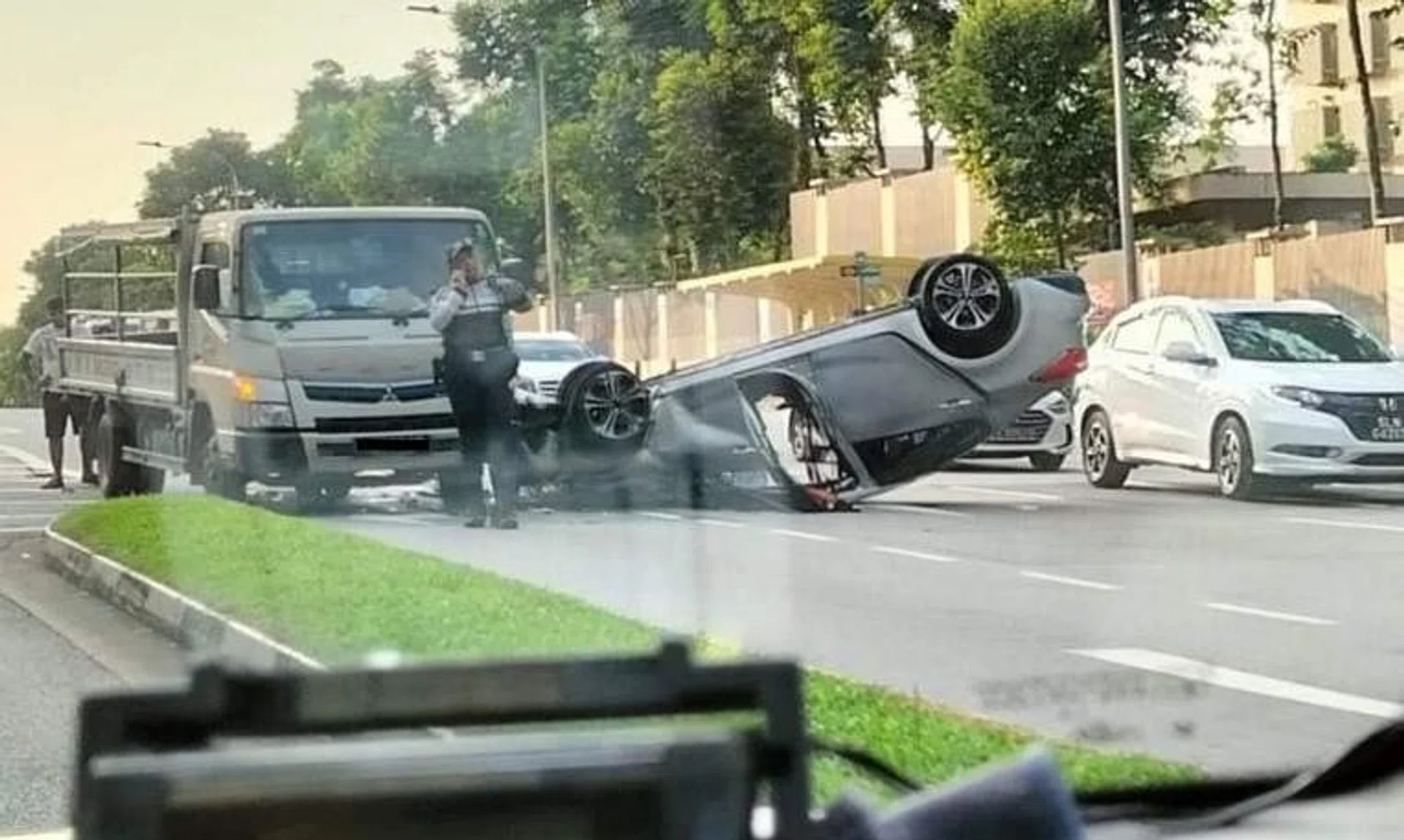 Both the car driver, 30, and his male passenger, 31, were conscious when taken to hospital.