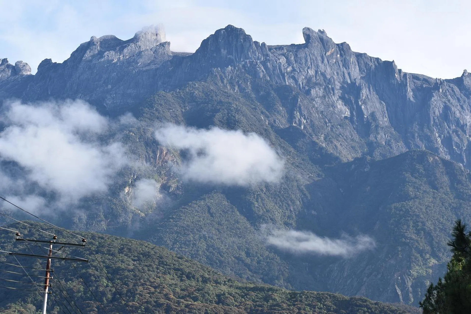 The 56-year-old woman was descending the mountain when she fell at around 7am.